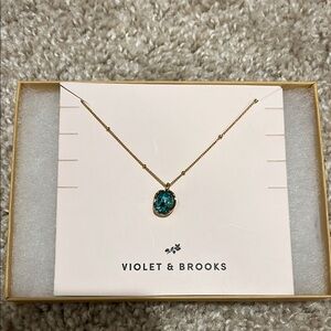 Gold Necklace with Blue Pendant